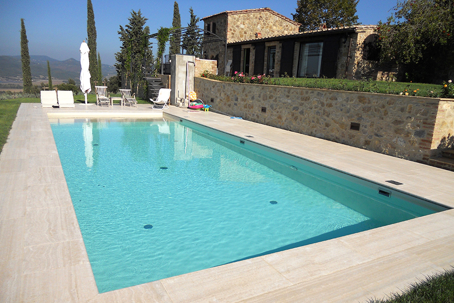 A swimming pool for a perfect farmhouse in Tuscany