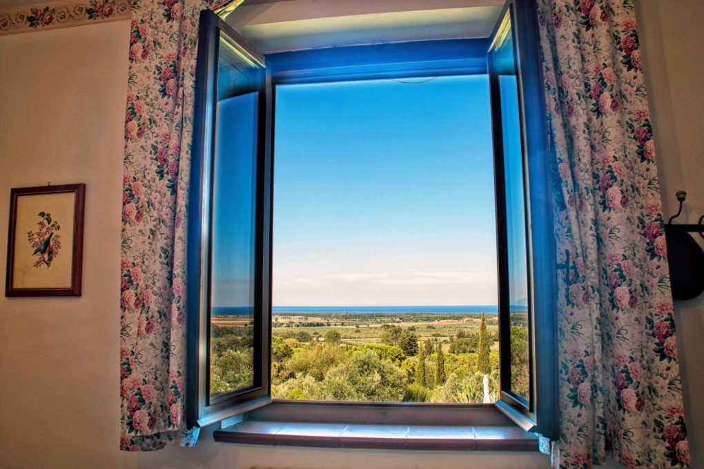 An opened window on the light blue sea of Tuscany, Casale Bellevue